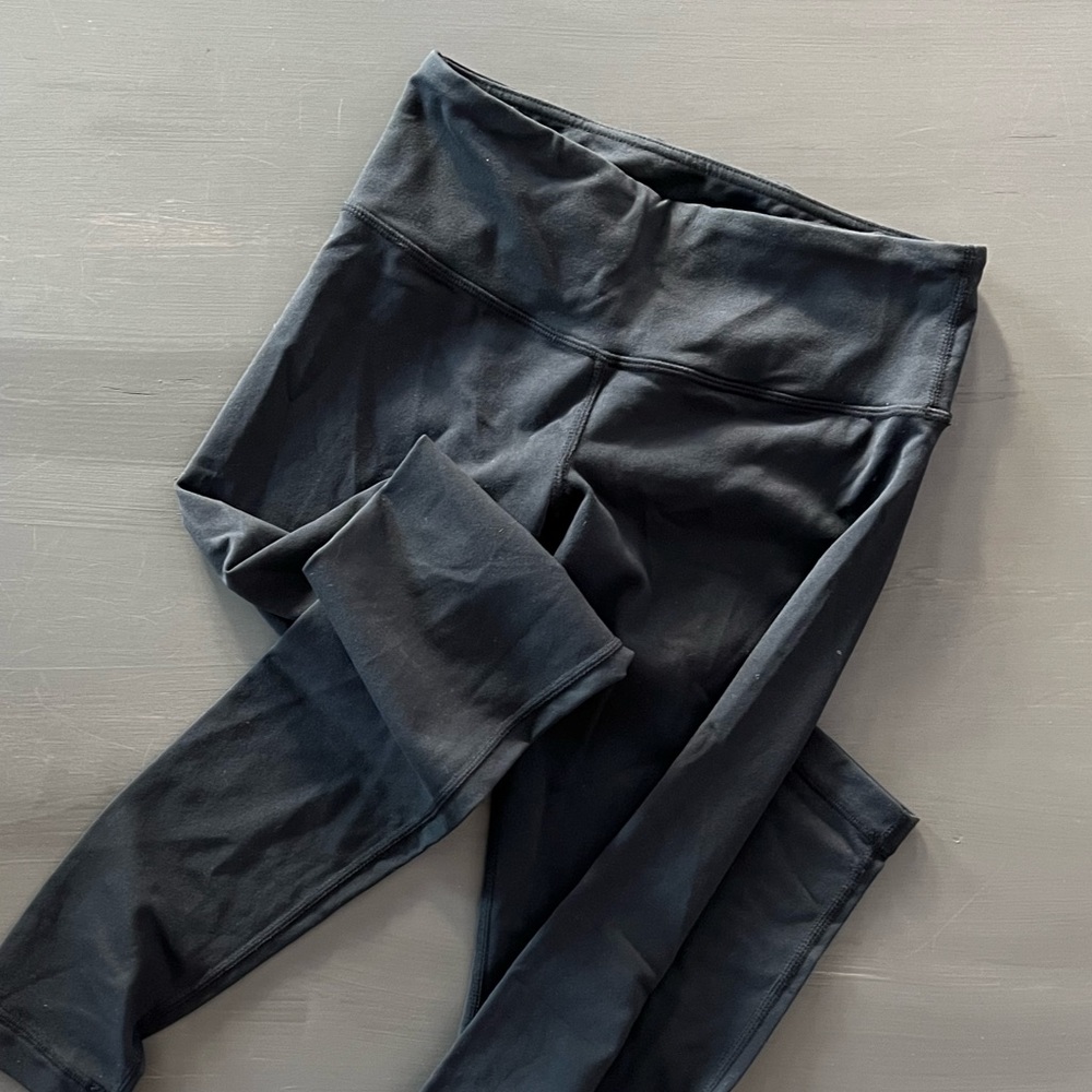 Lululemon black tights size 4